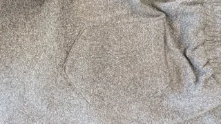 Pantalón deportivo Nike gris con blanco