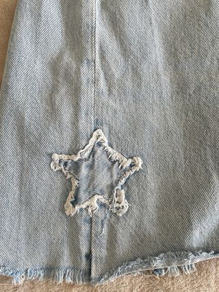 Pantalón vaquero con estrellas .Mango Teen