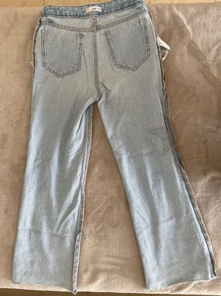 Pantalón vaquero con estrellas .Mango Teen