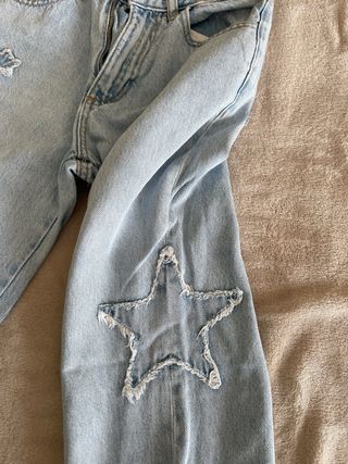 Pantalón vaquero con estrellas .Mango Teen