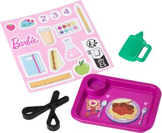 Barbie Maestra Muñeca de moda morena con un vestid