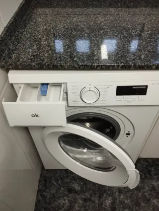 Lavadora OK. con apertura frontal 7kg.