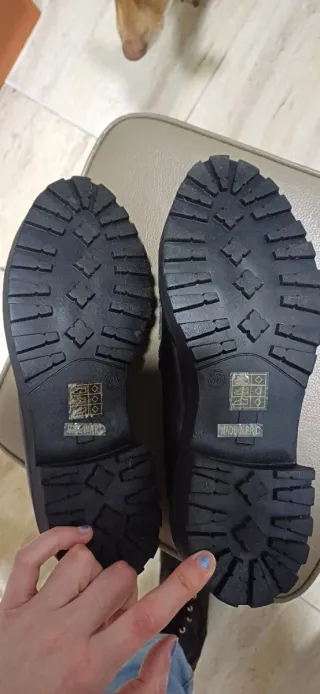 Mocasines negros con flecos y tachuelas