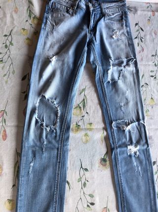 Jeans strappati blu