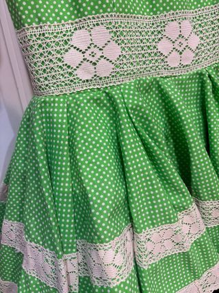 Traje de flamenca verde con volantes