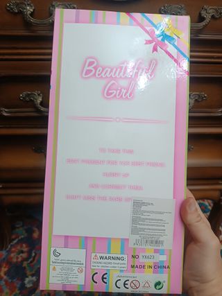 Muñeca con accesorios de cocina