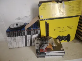 Consola PlayStation 2 + 30 juegos y mandos.