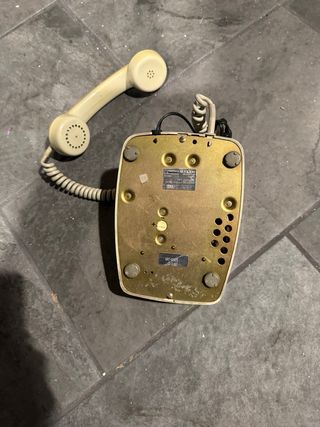 Teléfono antiguo beige de disco. Marca Cites