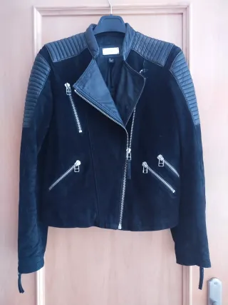 Cazadora Biker ante Negra Mango