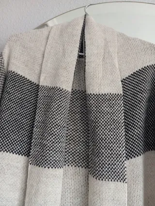 Chaqueta de punto crema y negro