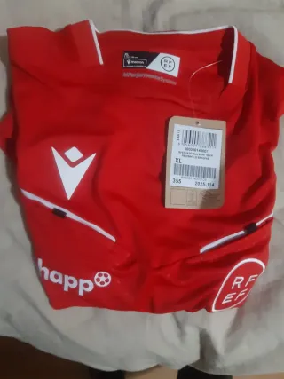 Ropa arbitraje Macron