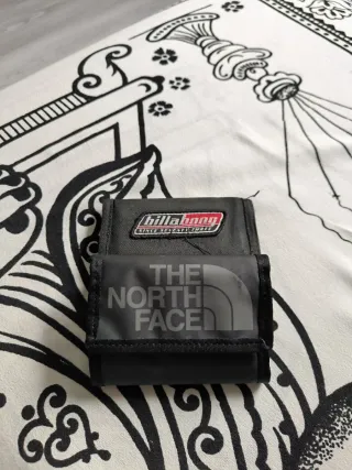 Lote Carteras Billabong y The North Face Negras