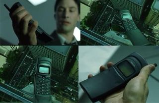 Movil K. Reeves Matrix Nokia 8110 con accesorios