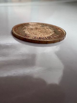 Moneda de oro de Alfonso XII 1876