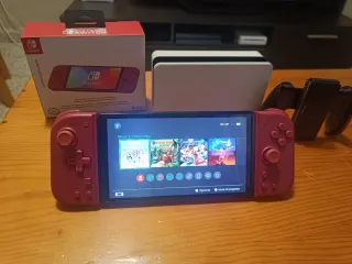 Nintendo Switch OLED blanco y joycon rojos nuevos