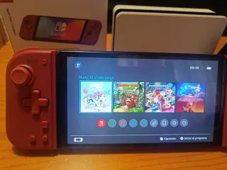 Nintendo Switch OLED blanco y joycon rojos nuevos