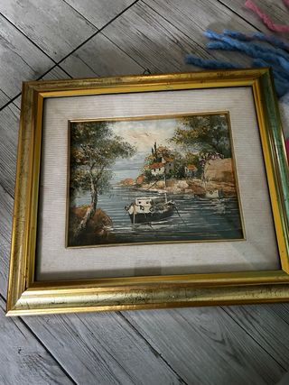 Quadro con cornice dorata