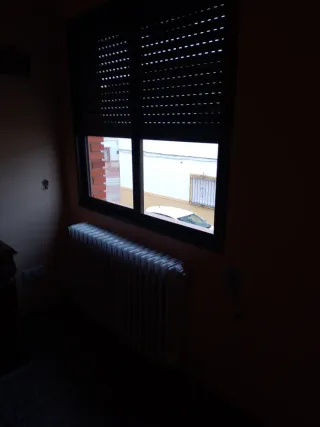 Ventanas y balcón aluminio bronce