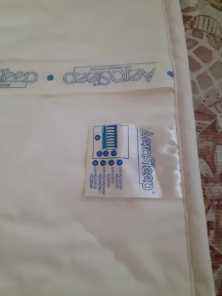 Materasso e coprimaterasso culla traspirante.