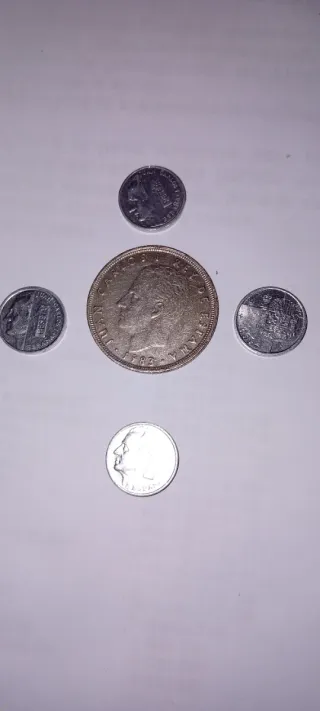 Lote 5 monedas: 1x25 ptas y 4x1 pta
