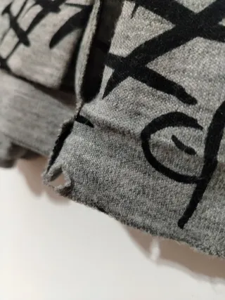 Gonna lunga asimmetrica maglia grigia nera