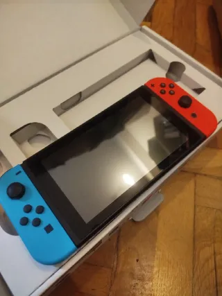 Nintendo Switch Azul/Naranja Casi Nuevo