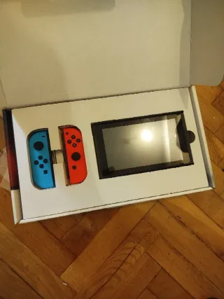 Nintendo Switch Azul/Naranja Casi Nuevo