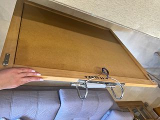 Espejo de madera maciza con aplique