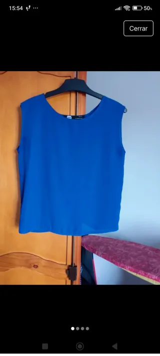Blusa sin mangas azul de espalda abierta Celop