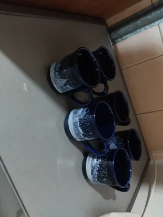 Tazas de cerámica azul con diseño