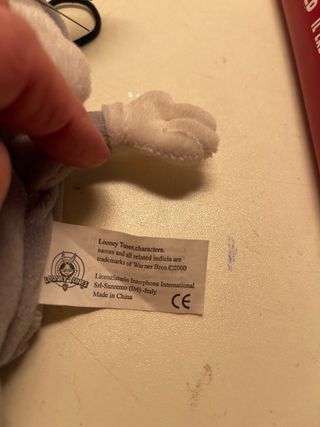 Peluche Bugs Bunny con tasca porta tutto