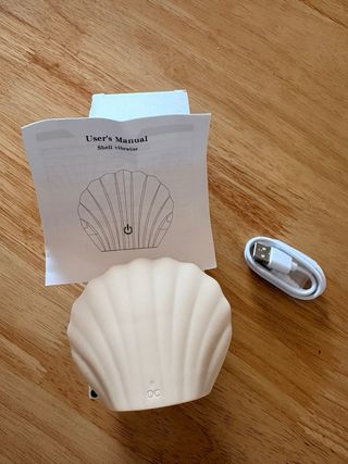 Vibrador con forma de concha