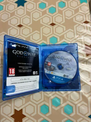 God of war ragnarok + Libro de arte ps4 ps5