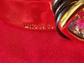 Pulsera Uno de 50 dorada con piedra