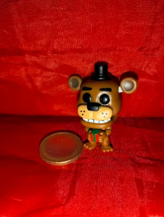 Funko Pop Freddy Fazbear con regalo