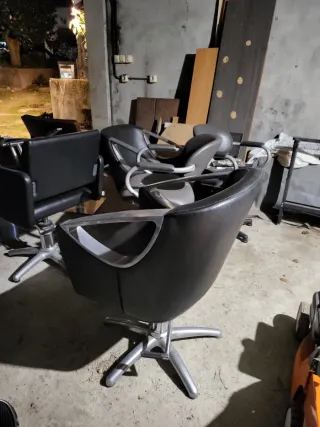 Sillón de peluquería negro y gris