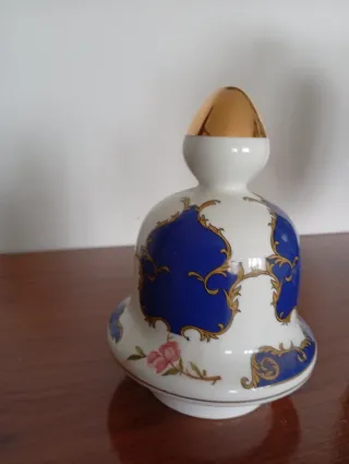 Jarrón tibor de porcelana azul y dorado