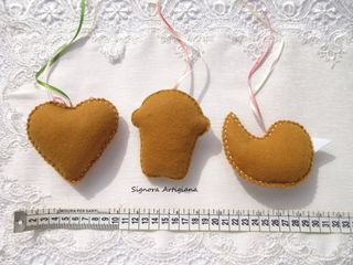 Decorazioni in feltro. Dolcetto cuore e uccellino.