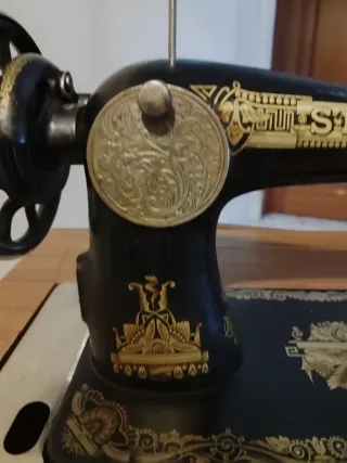 Máquina de coser Singer Esfinge antigua