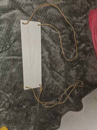 Colgante decorativo madera y cuerda.