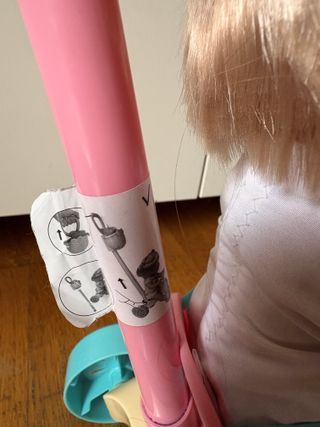 Muñeca Nenuco con triciclo rosa y azul