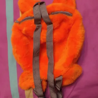 Mochila peluche cerdito naranja