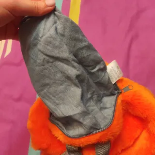 Mochila peluche cerdito naranja