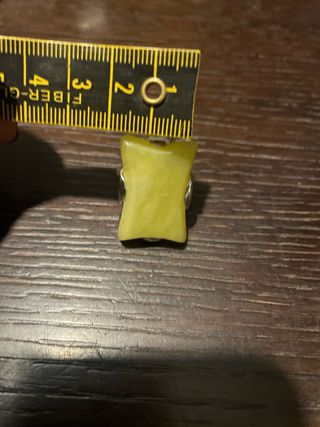 Anello giallo con dettagli argento