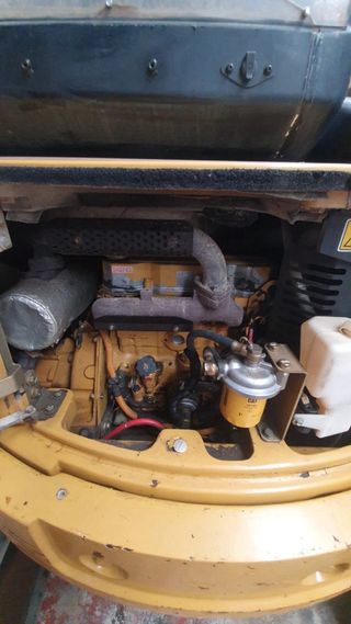 Retroexcavadora Caterpillar Mini