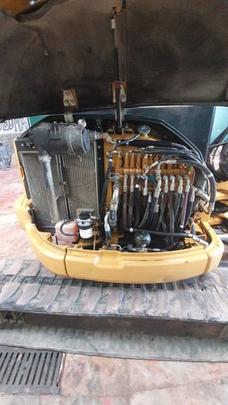Retroexcavadora Caterpillar Mini