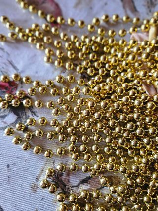 Costume burlesque perle dorate