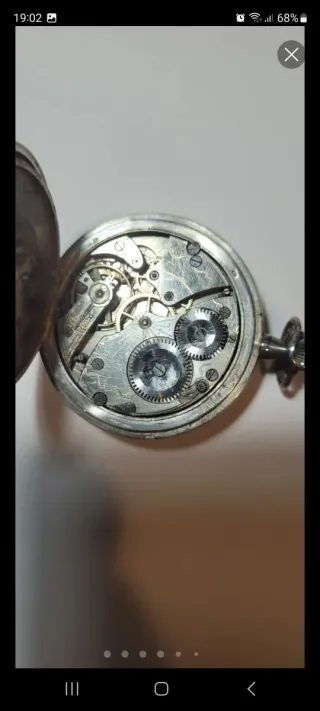 Reloj de bolsillo de plata, antiguo grabado