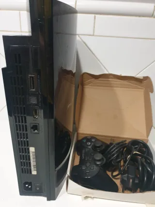 PlayStation 3 con 4 juegos