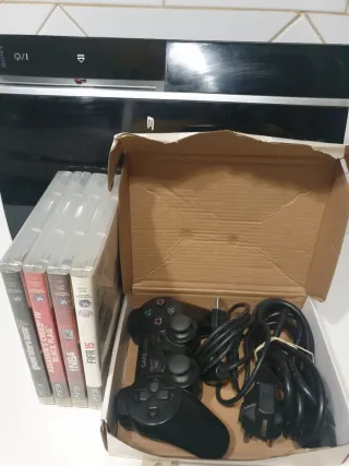 PlayStation 3 con 4 juegos